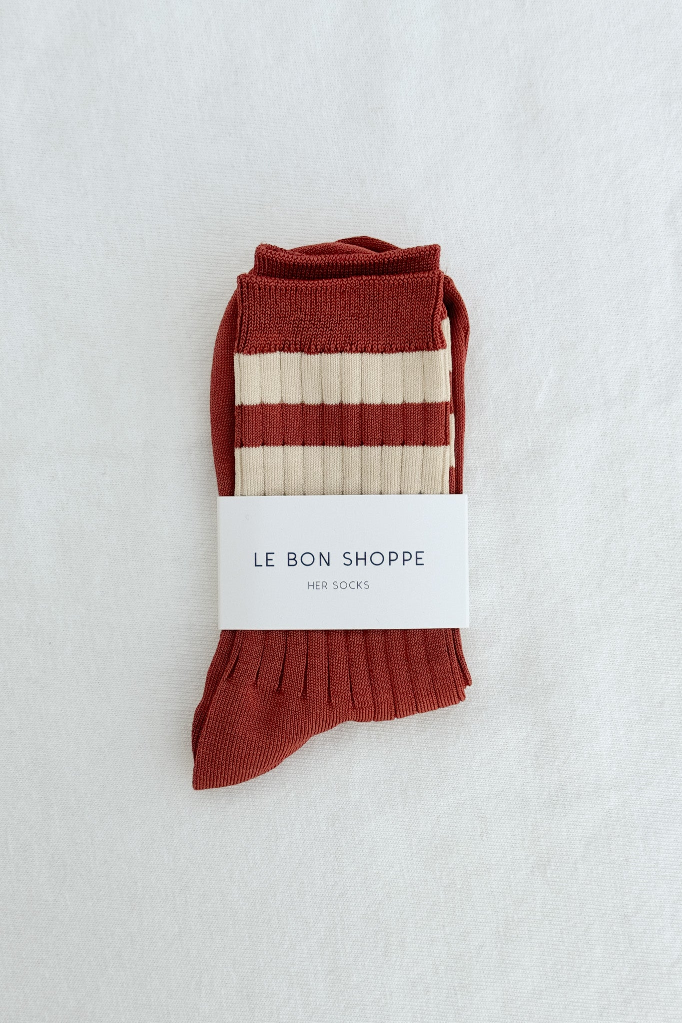 Ses chaussettes universitaires - Tandoori